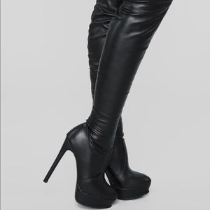 Thigh high leather boots